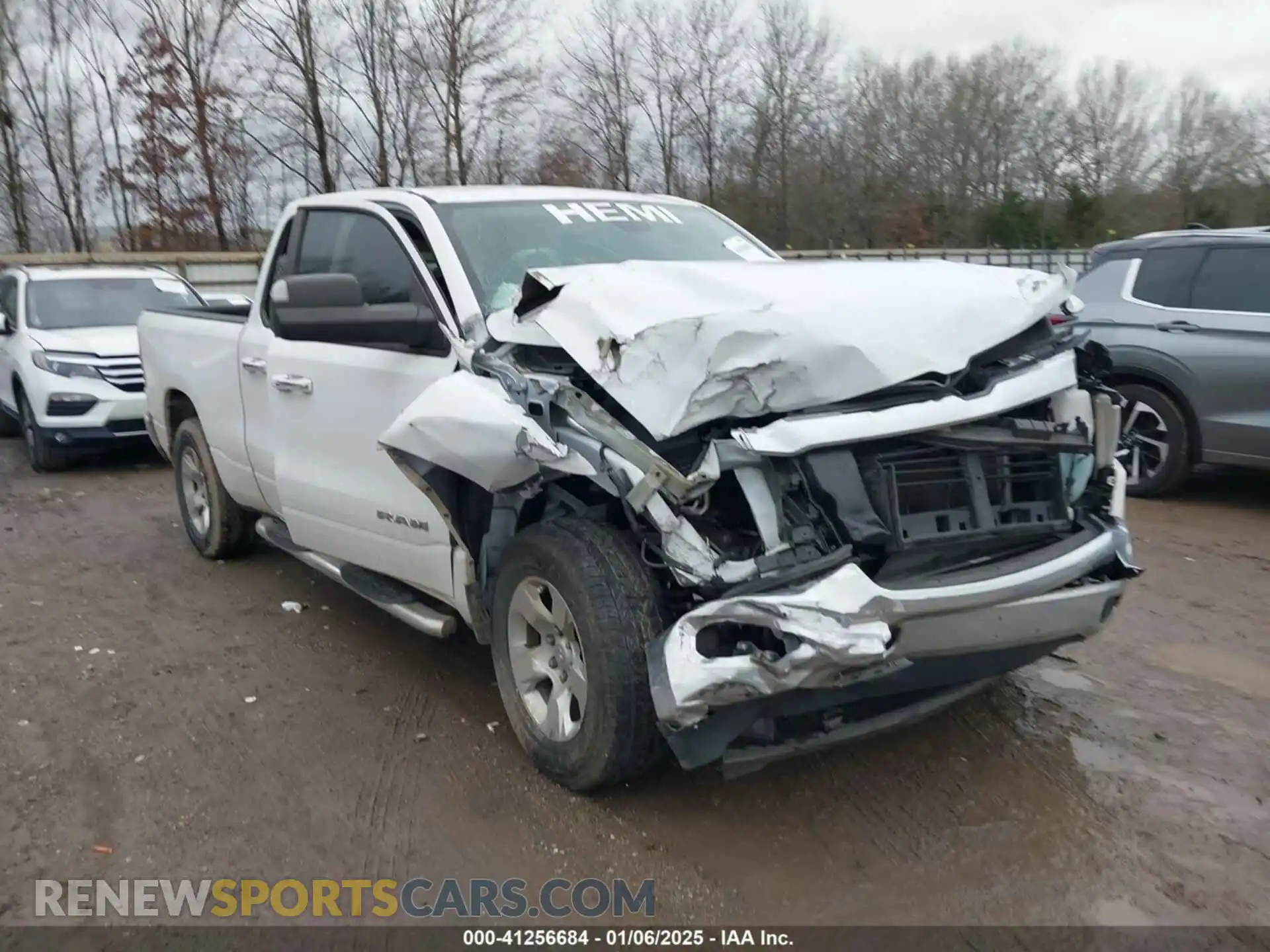 1 Photograph of a damaged car 1C6SRFBT0KN822299 RAM 1500 2019