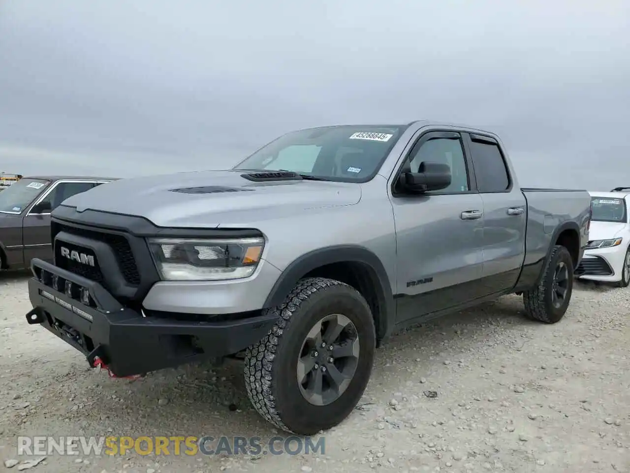 1 Photograph of a damaged car 1C6SRFET0KN841074 RAM 1500 2019