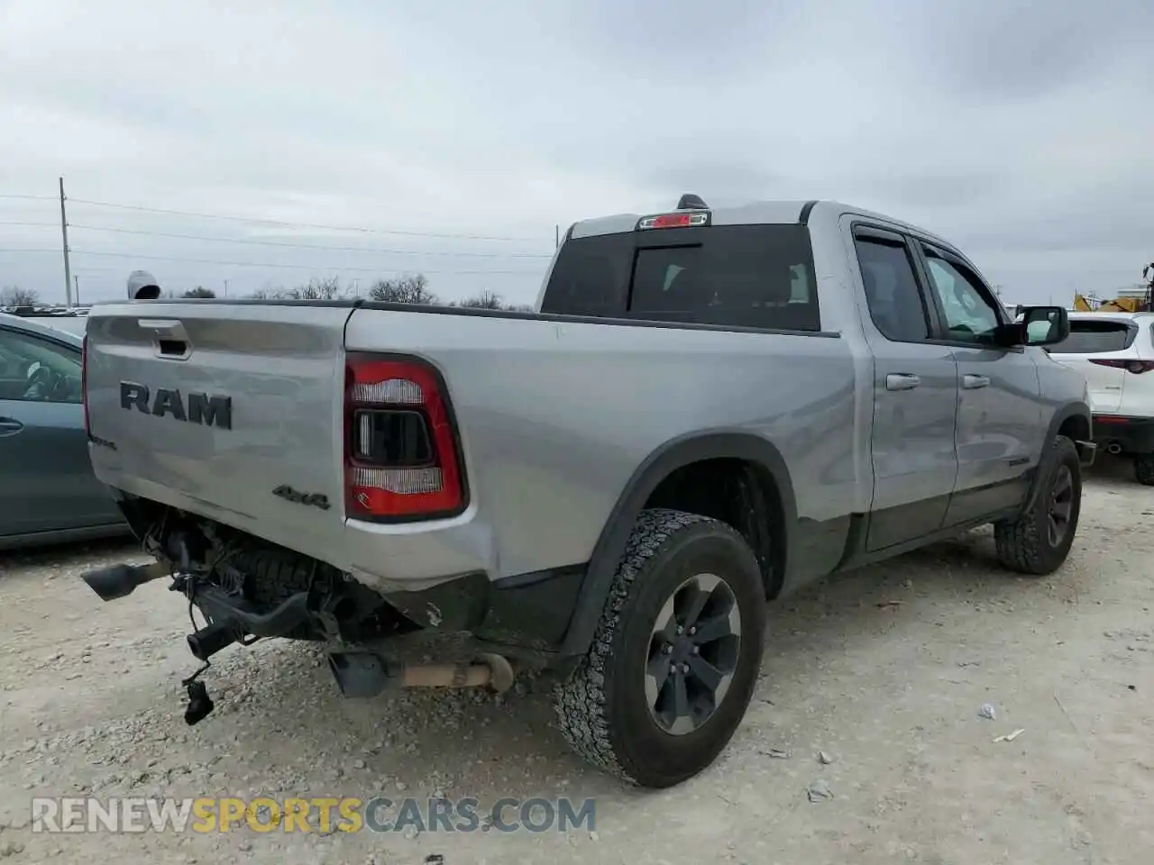 3 Photograph of a damaged car 1C6SRFET0KN841074 RAM 1500 2019