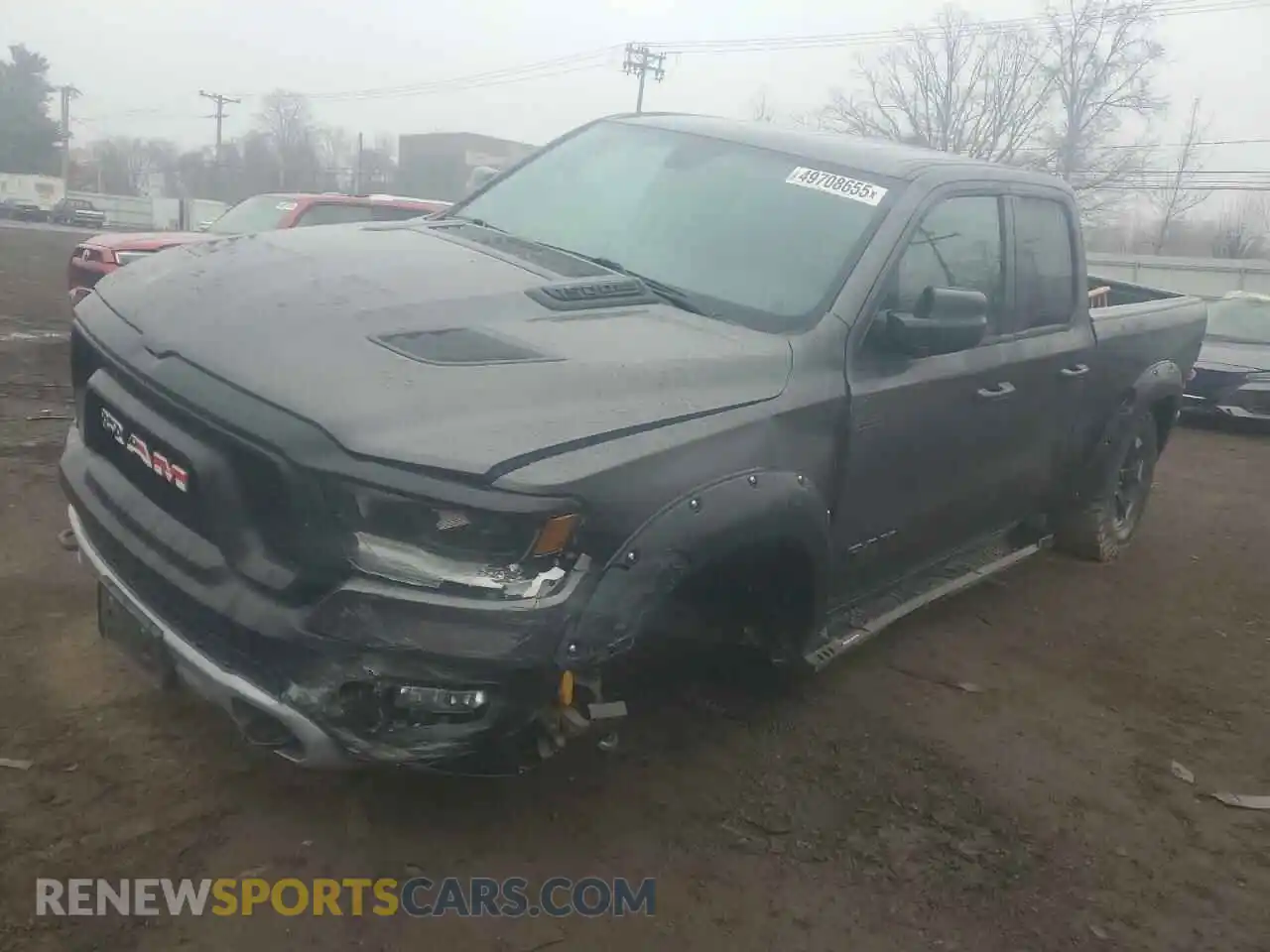 1 Photograph of a damaged car 1C6SRFET2KN848737 RAM 1500 2019