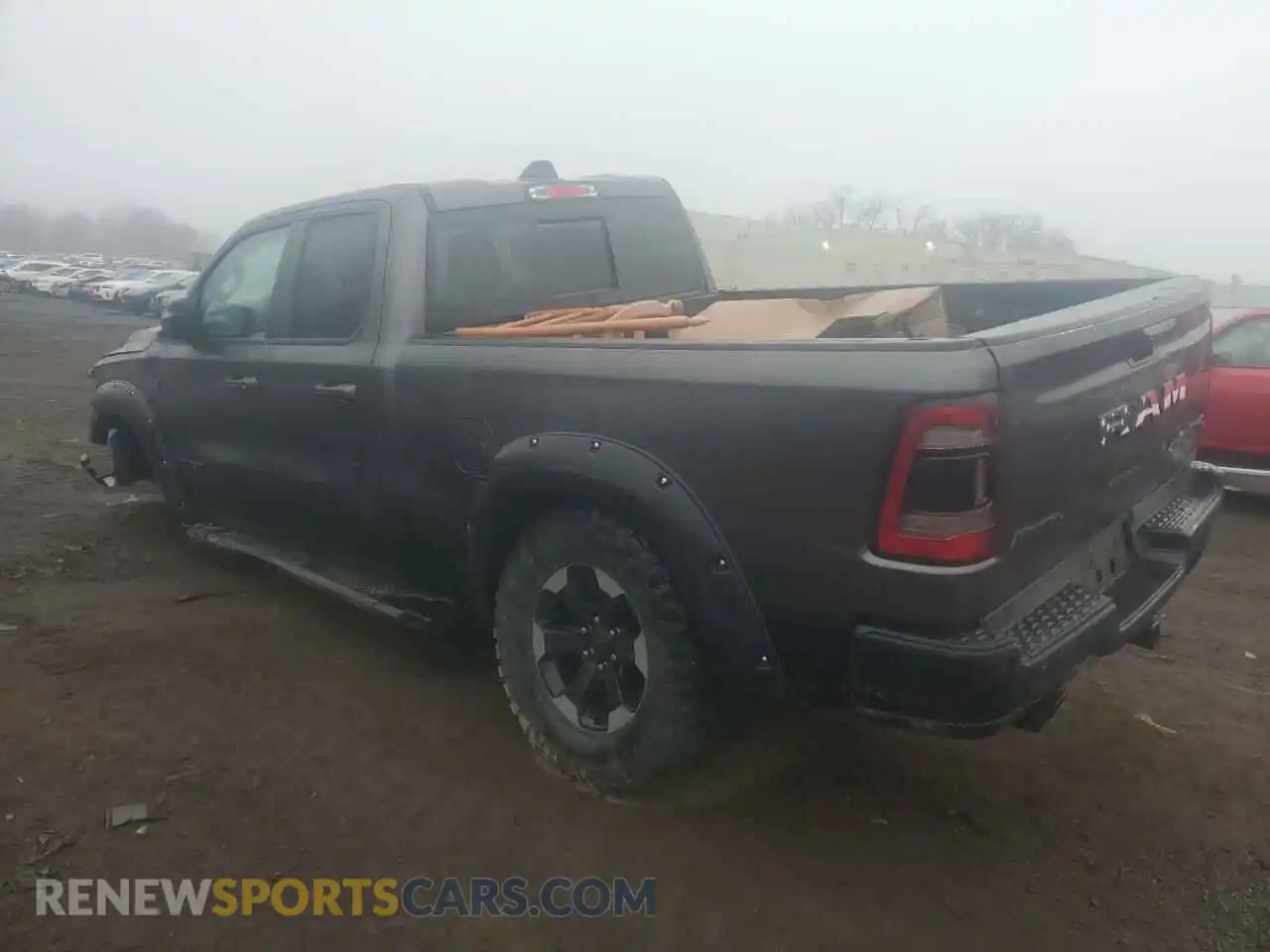 2 Photograph of a damaged car 1C6SRFET2KN848737 RAM 1500 2019