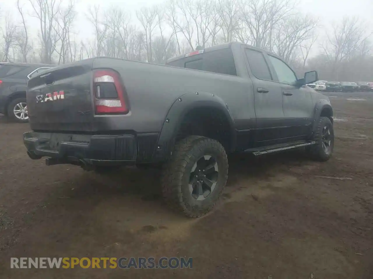 3 Photograph of a damaged car 1C6SRFET2KN848737 RAM 1500 2019