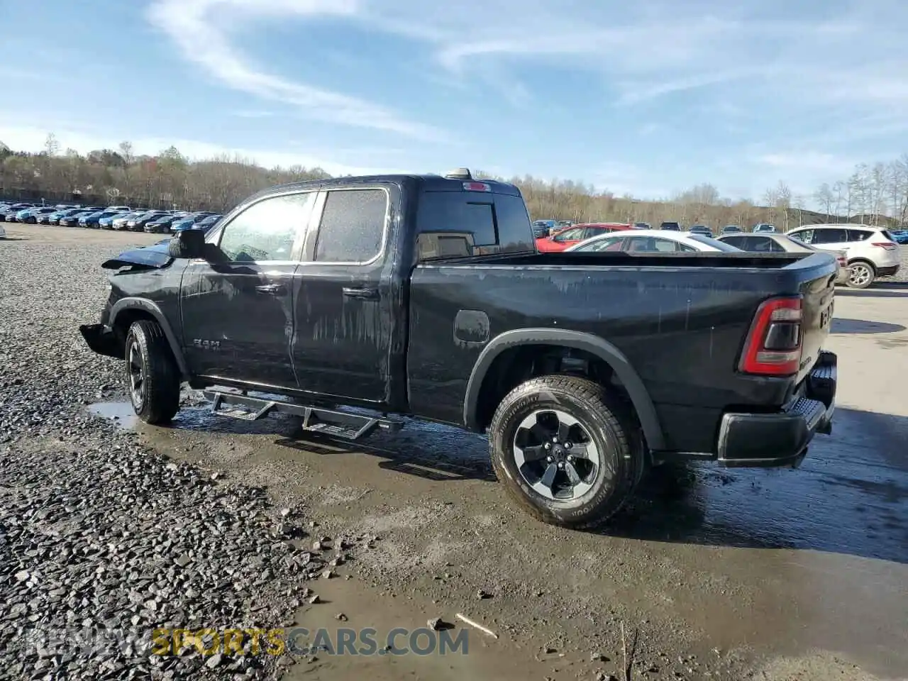 2 Photograph of a damaged car 1C6SRFET5KN580766 RAM 1500 2019