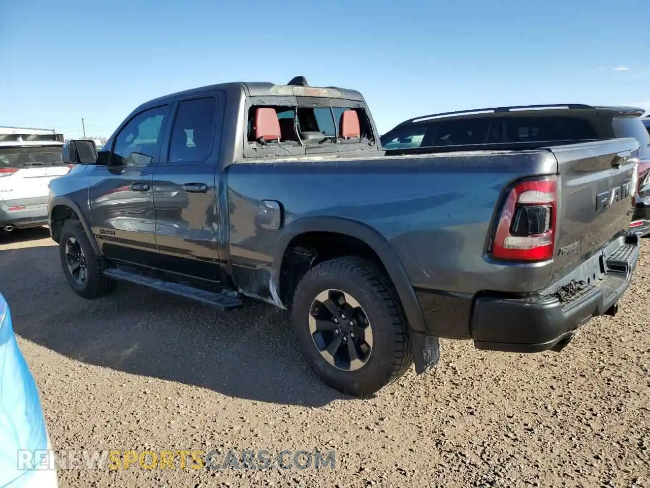 2 Photograph of a damaged car 1C6SRFET7KN865176 RAM 1500 2019