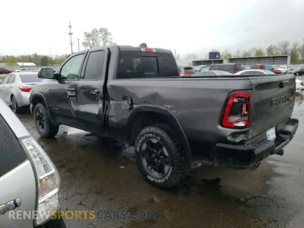 2 Photograph of a damaged car 1C6SRFET9KN717269 RAM 1500 2019