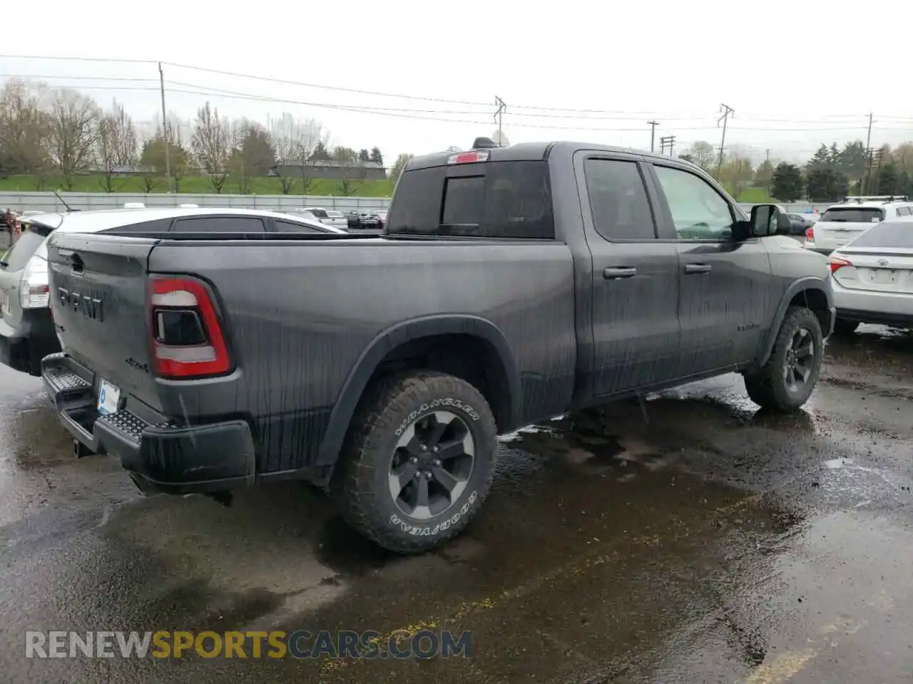 3 Photograph of a damaged car 1C6SRFET9KN717269 RAM 1500 2019