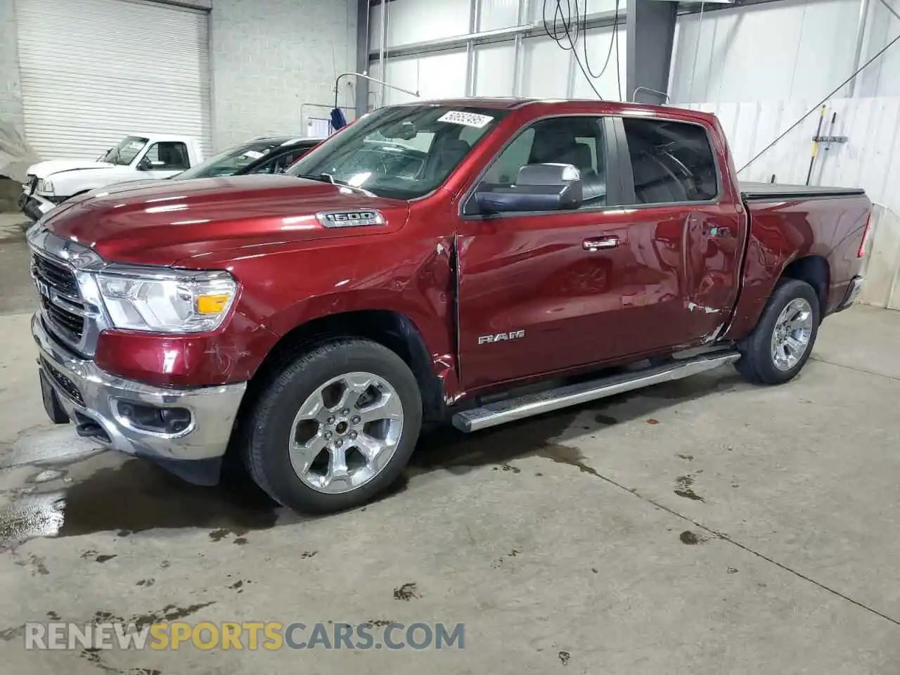 1 Photograph of a damaged car 1C6SRFFT0KN586554 RAM 1500 2019