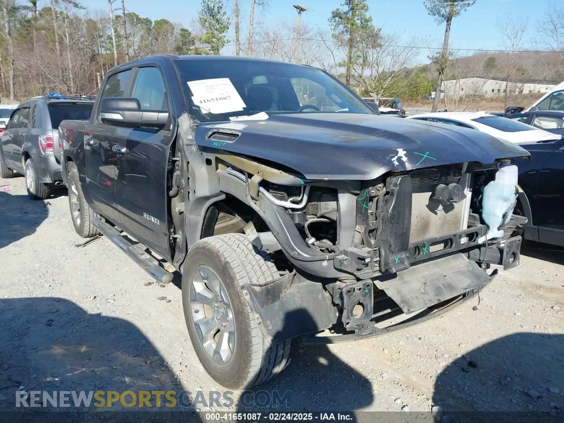 1 Photograph of a damaged car 1C6SRFFT0KN627457 RAM 1500 2019