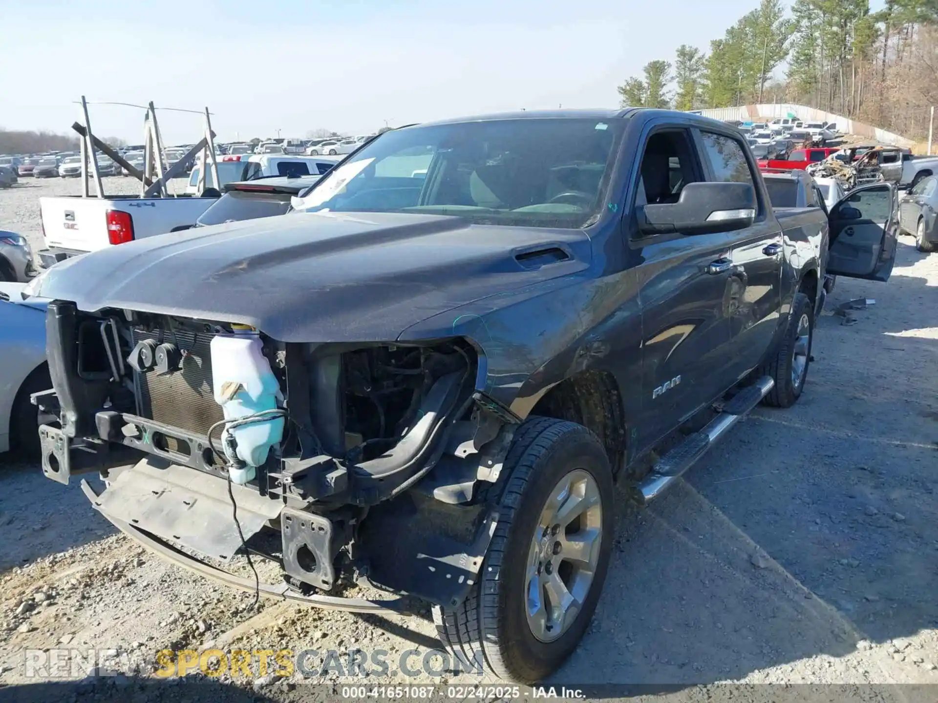 2 Photograph of a damaged car 1C6SRFFT0KN627457 RAM 1500 2019