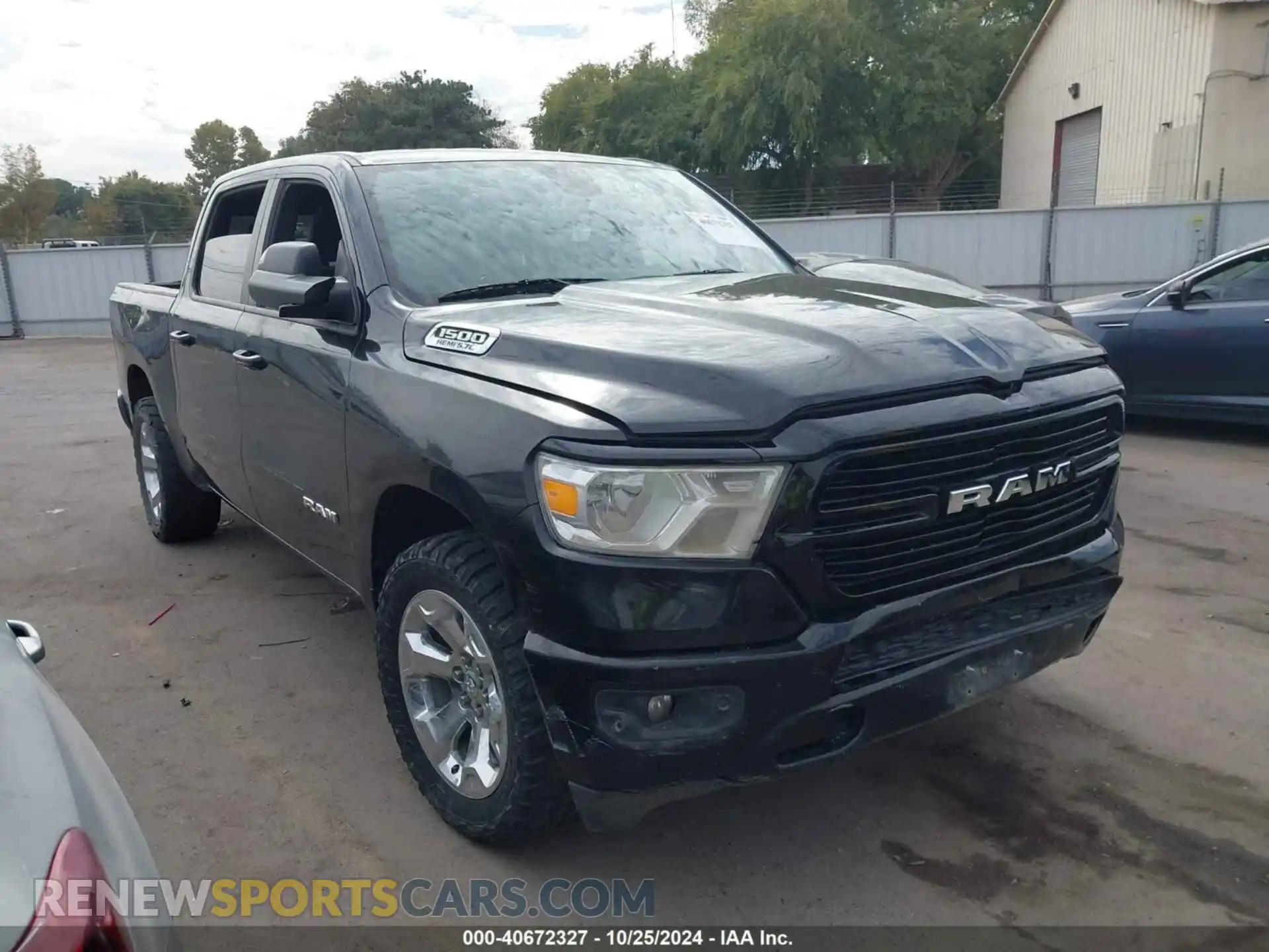 1 Photograph of a damaged car 1C6SRFFT0KN804461 RAM 1500 2019