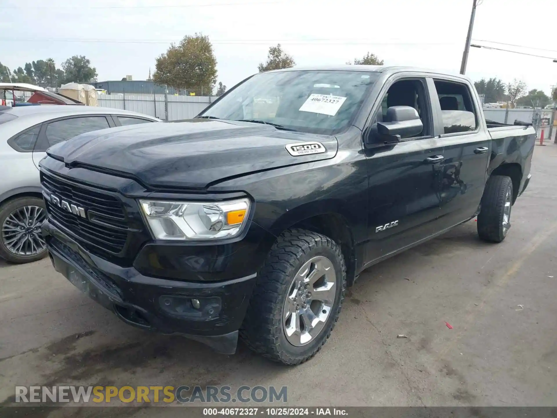 2 Photograph of a damaged car 1C6SRFFT0KN804461 RAM 1500 2019