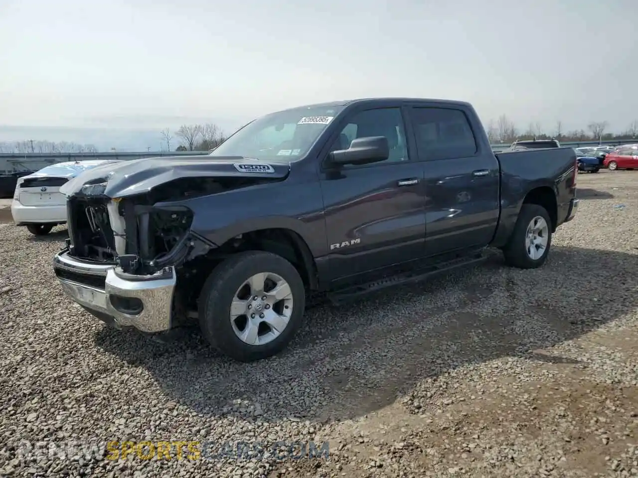 1 Photograph of a damaged car 1C6SRFFT1KN621098 RAM 1500 2019