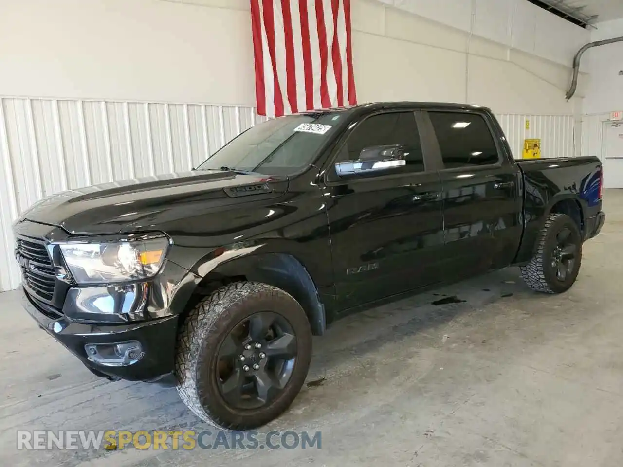 1 Photograph of a damaged car 1C6SRFFT1KN630612 RAM 1500 2019