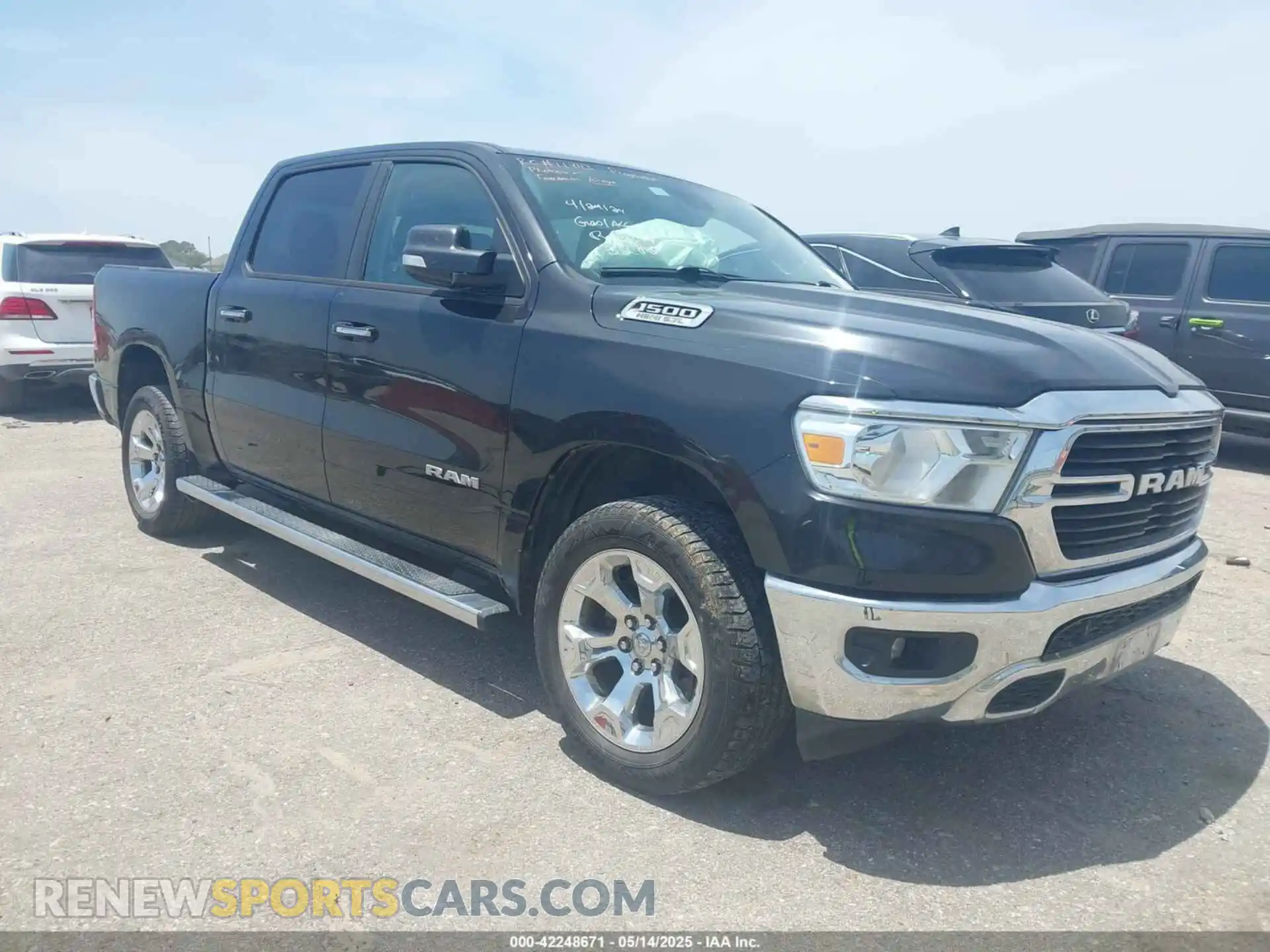1 Photograph of a damaged car 1C6SRFFT1KN663285 RAM 1500 2019