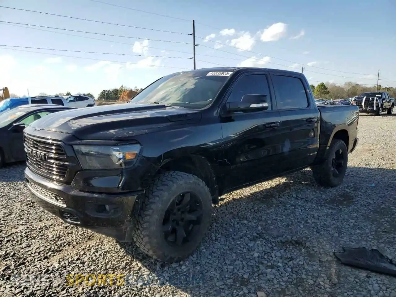 1 Photograph of a damaged car 1C6SRFFT1KN708855 RAM 1500 2019