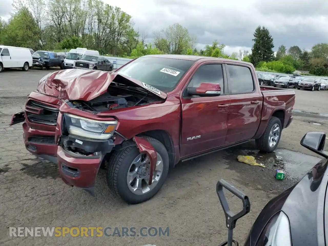 1 Photograph of a damaged car 1C6SRFFT2KN626164 RAM 1500 2019