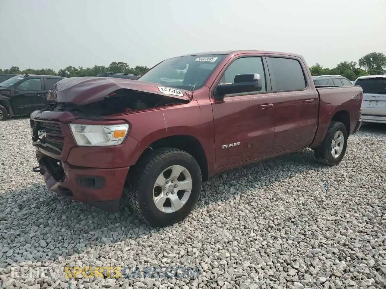 1 Photograph of a damaged car 1C6SRFFT2KN677017 RAM 1500 2019
