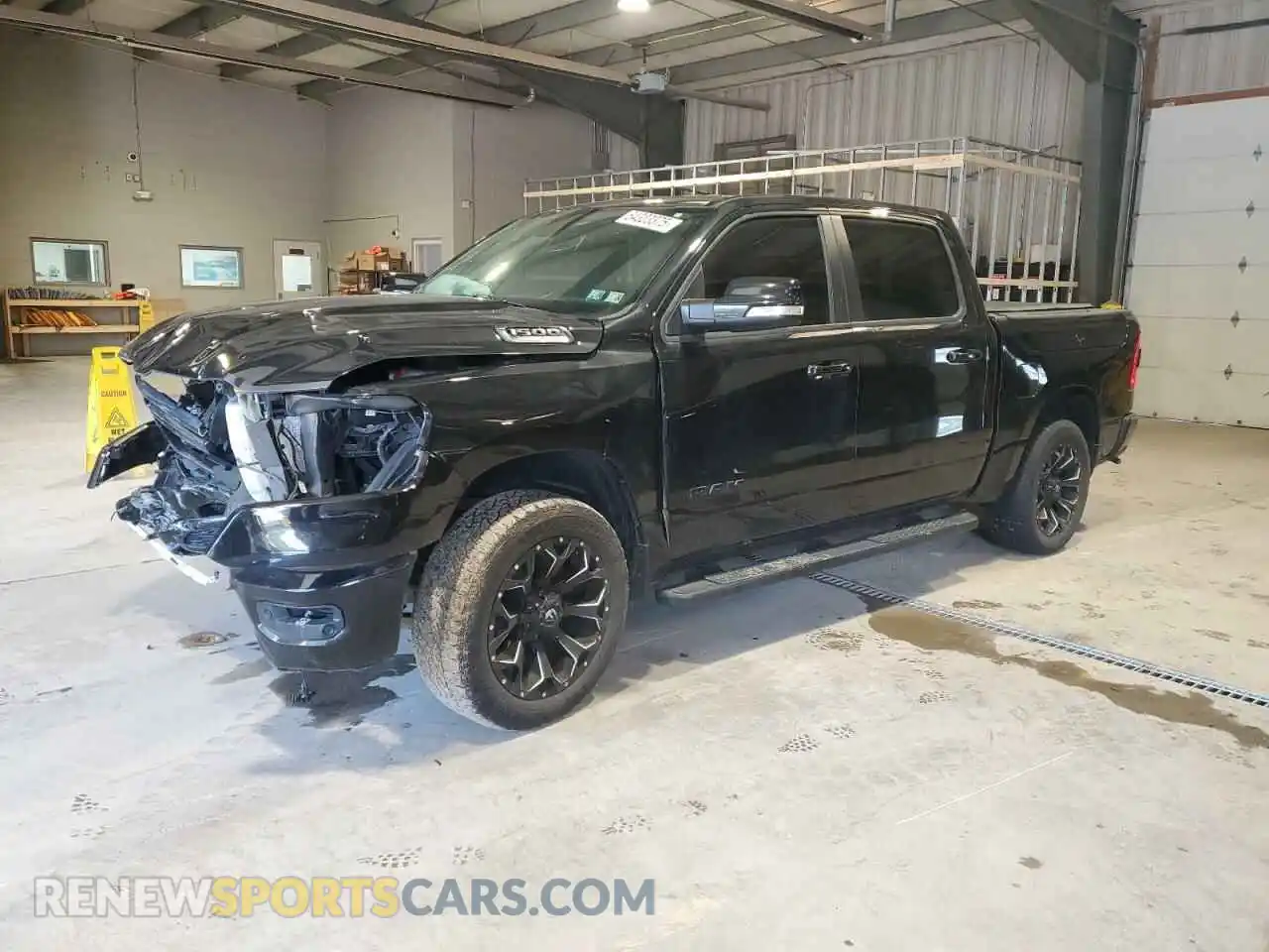 1 Photograph of a damaged car 1C6SRFFT2KN815574 RAM 1500 2019