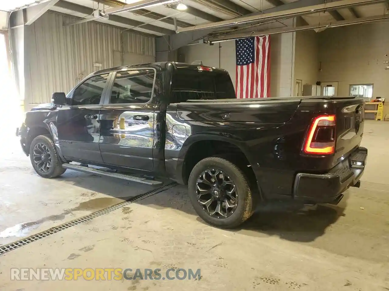 2 Photograph of a damaged car 1C6SRFFT2KN815574 RAM 1500 2019