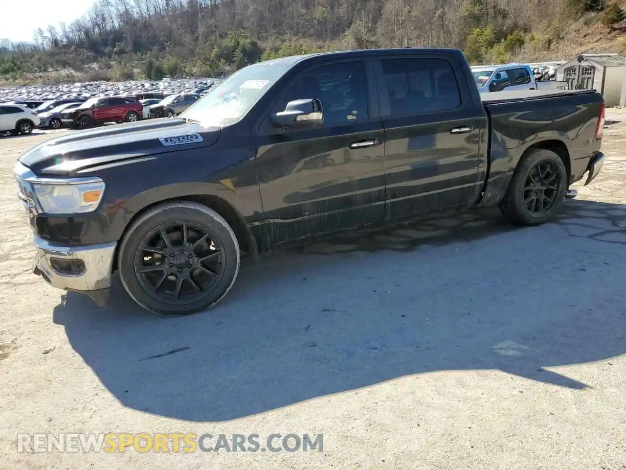 1 Photograph of a damaged car 1C6SRFFT2KN852673 RAM 1500 2019