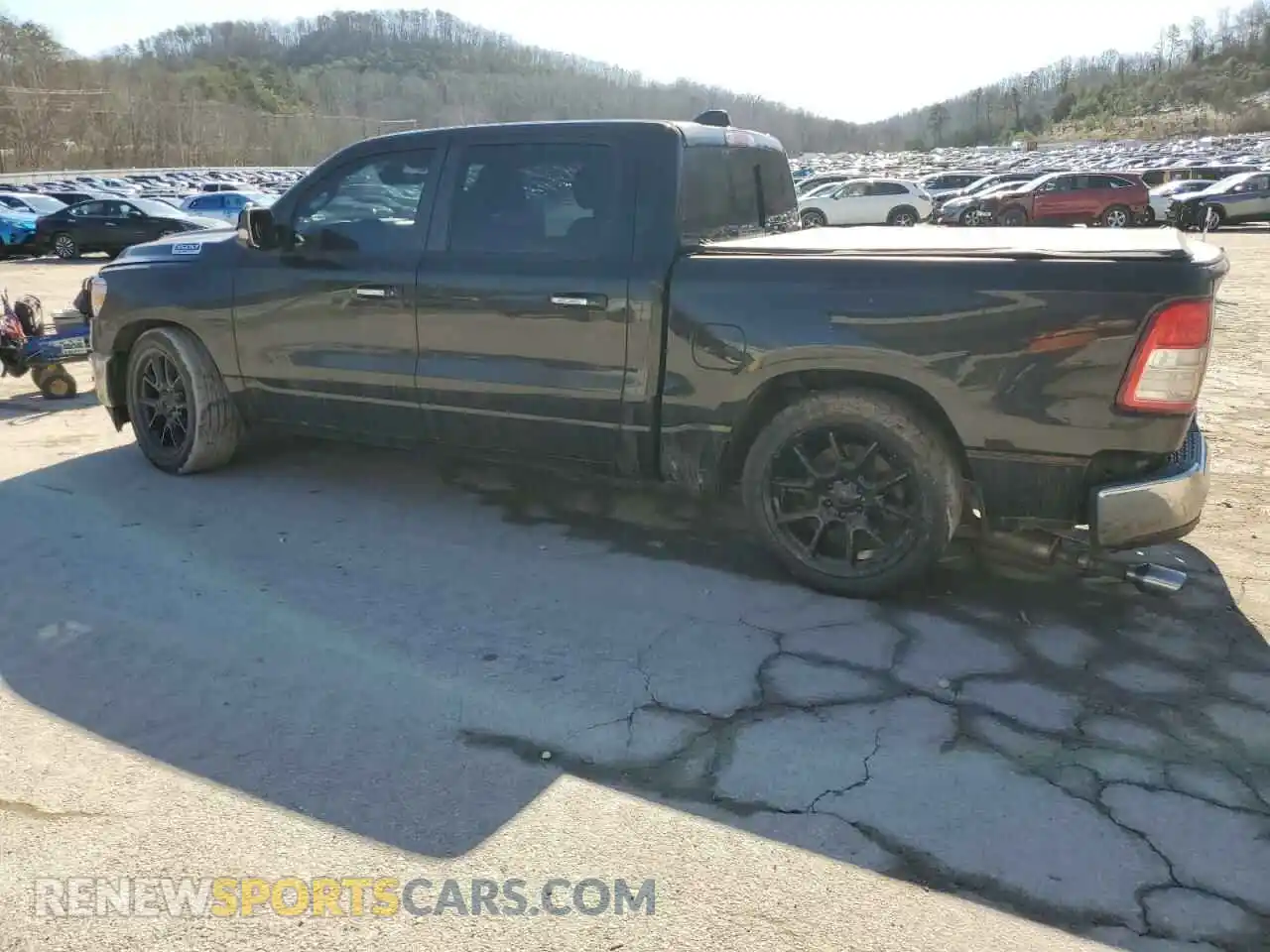2 Photograph of a damaged car 1C6SRFFT2KN852673 RAM 1500 2019