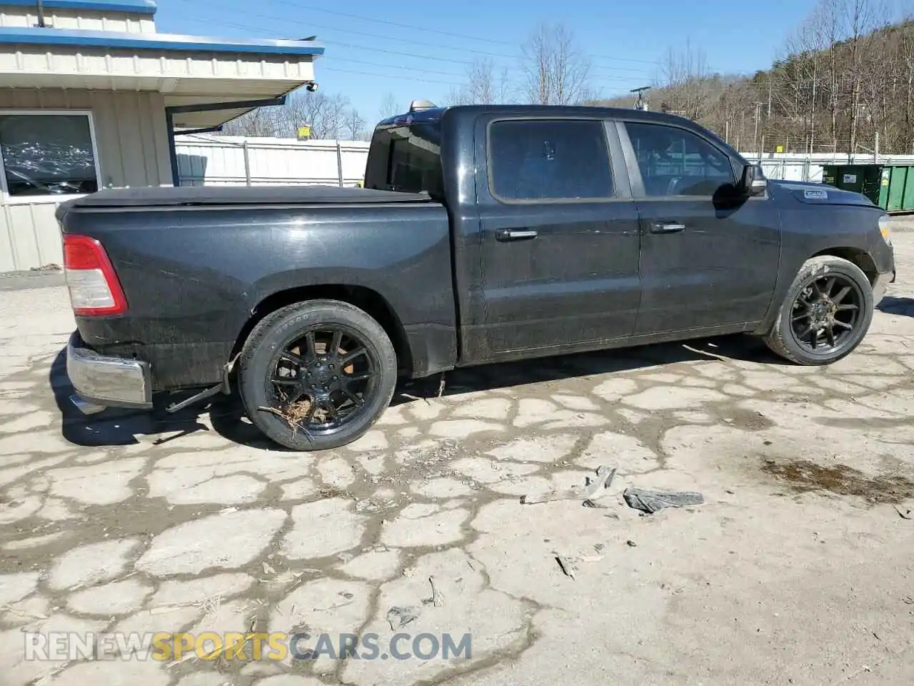 3 Photograph of a damaged car 1C6SRFFT2KN852673 RAM 1500 2019