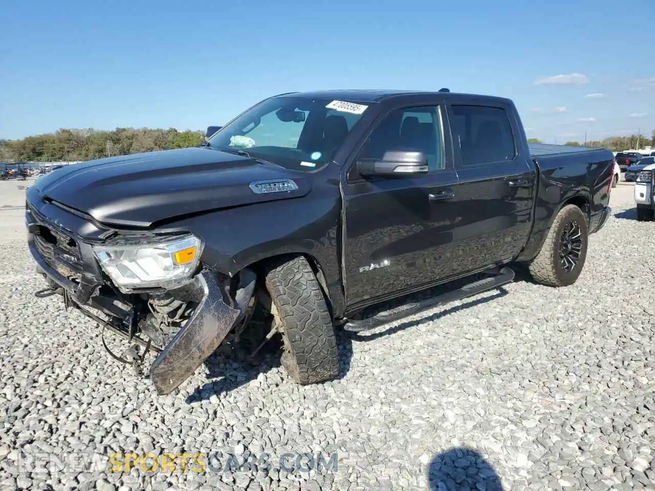 1 Photograph of a damaged car 1C6SRFFT3KN574379 RAM 1500 2019