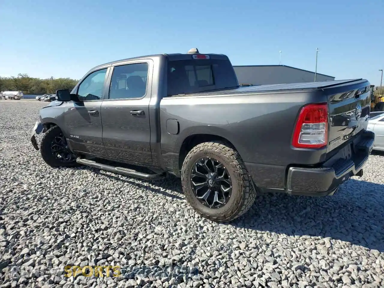 2 Photograph of a damaged car 1C6SRFFT3KN574379 RAM 1500 2019