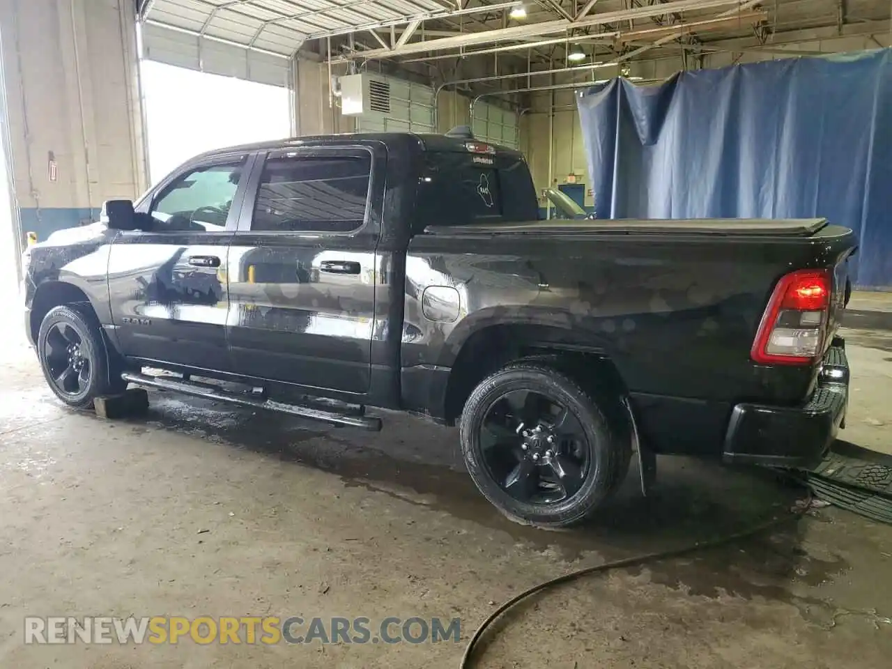2 Photograph of a damaged car 1C6SRFFT3KN783850 RAM 1500 2019