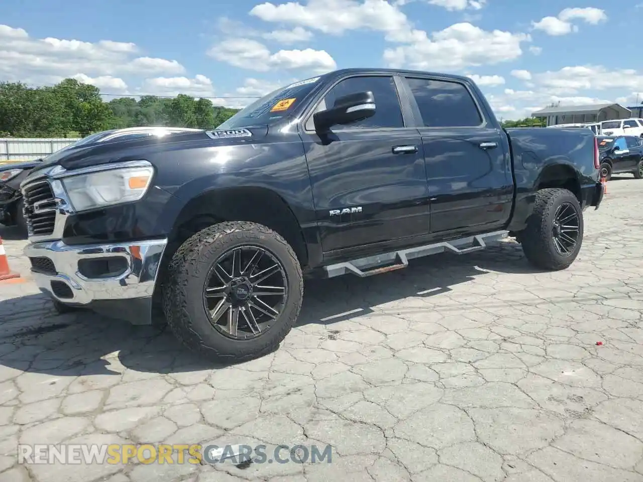 1 Photograph of a damaged car 1C6SRFFT4KN553413 RAM 1500 2019