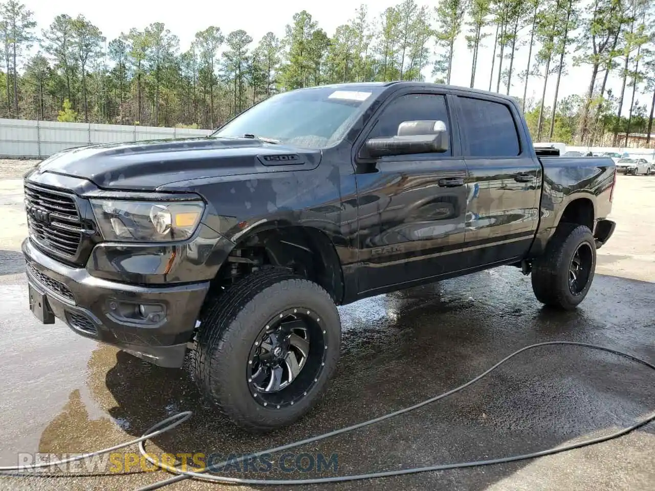 1 Photograph of a damaged car 1C6SRFFT4KN687659 RAM 1500 2019