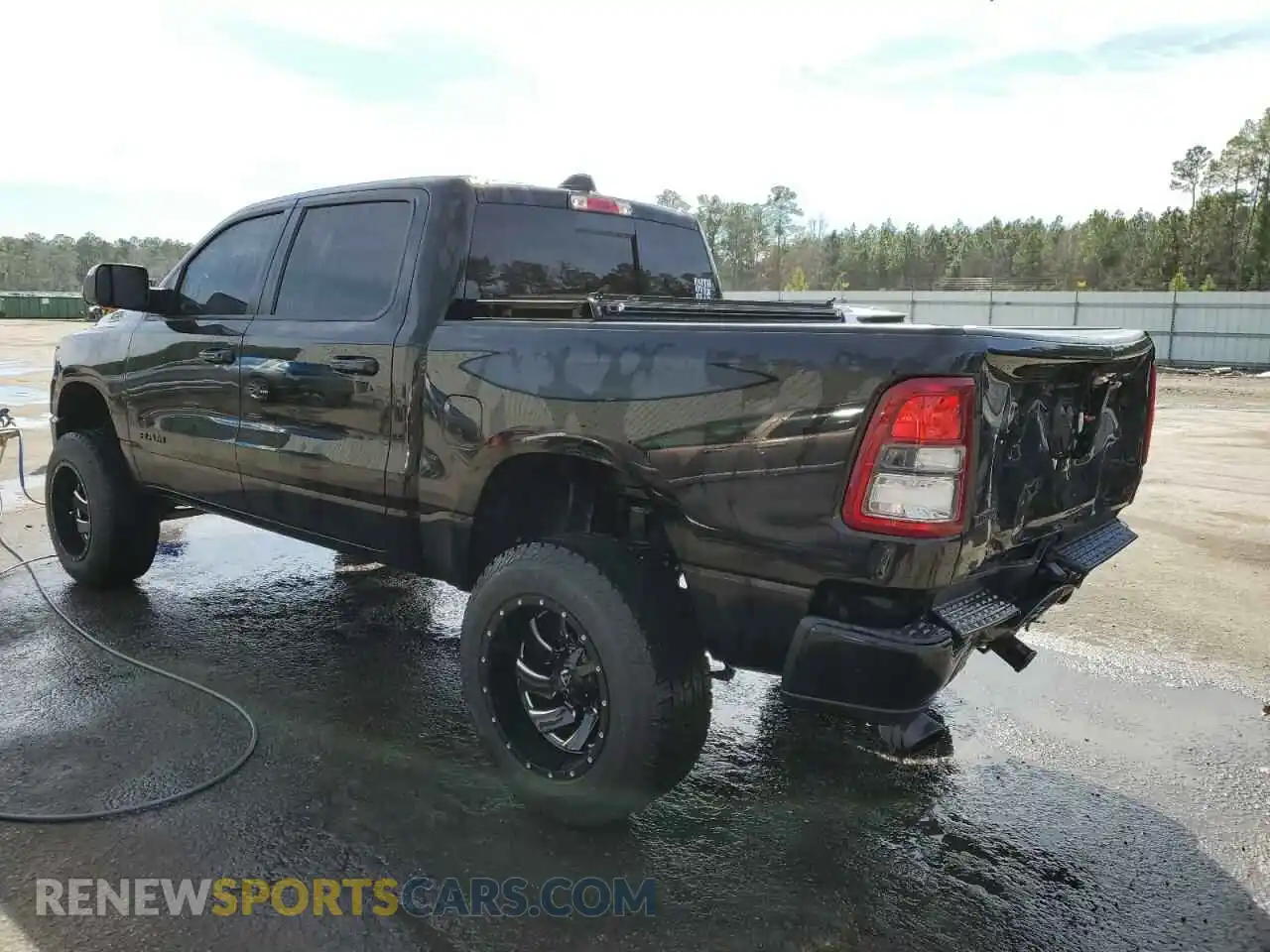2 Photograph of a damaged car 1C6SRFFT4KN687659 RAM 1500 2019