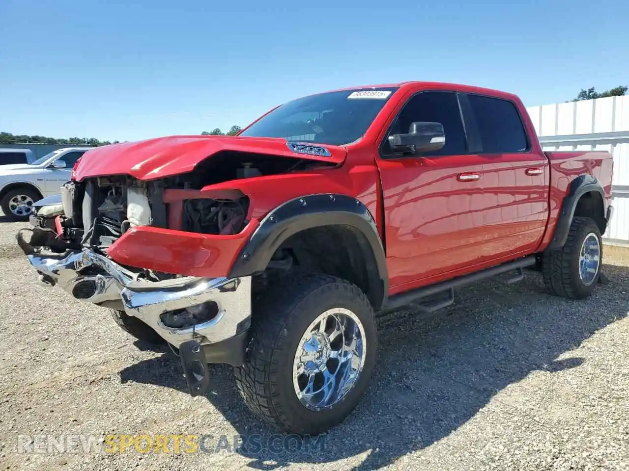 1 Photograph of a damaged car 1C6SRFFT4KN842212 RAM 1500 2019