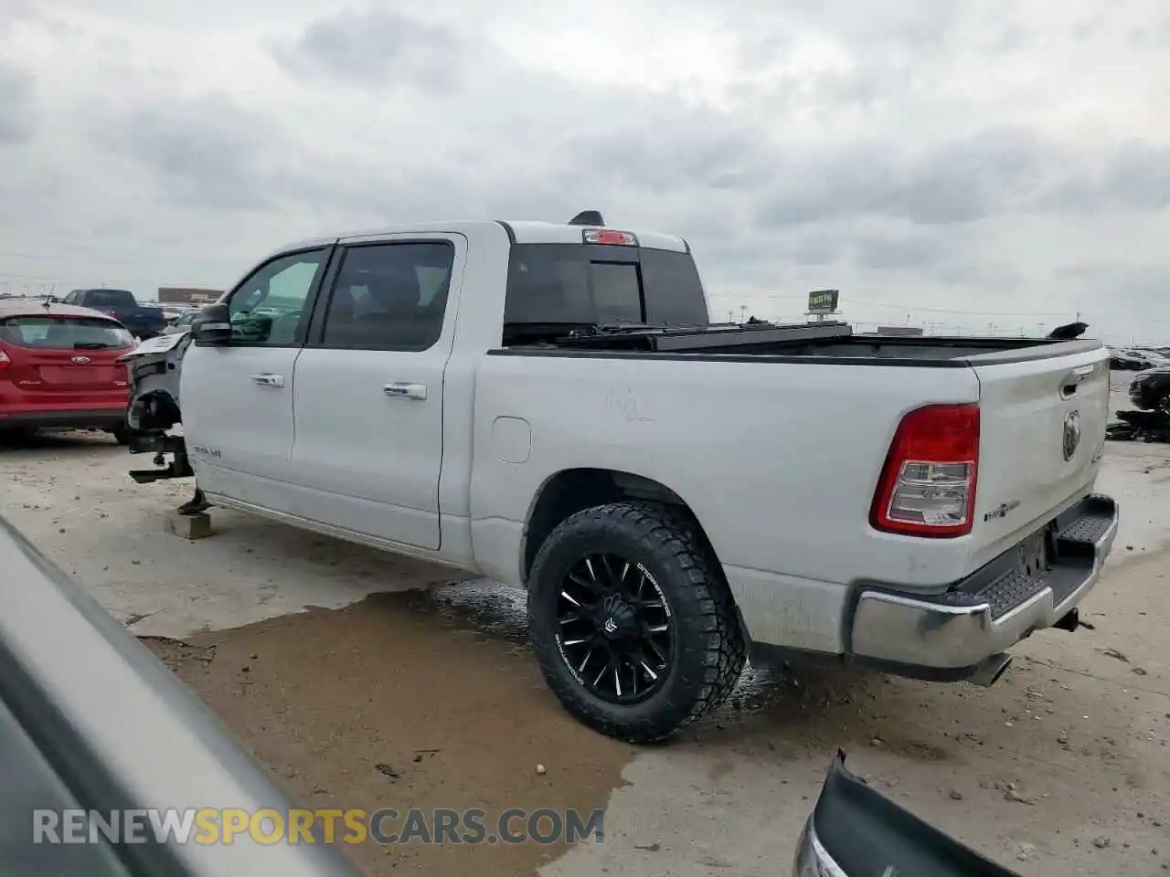 2 Photograph of a damaged car 1C6SRFFT5KN570365 RAM 1500 2019