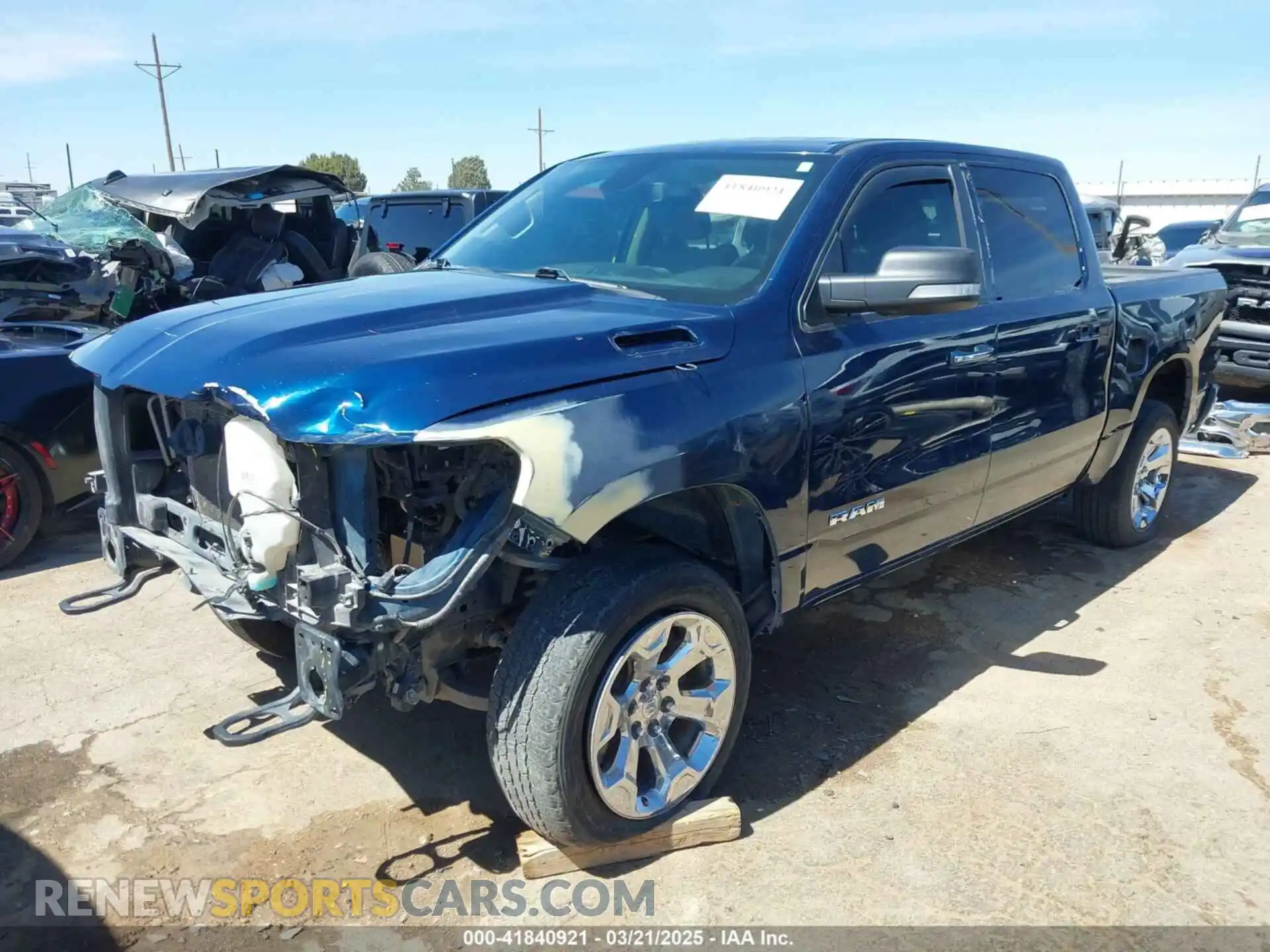 2 Photograph of a damaged car 1C6SRFFT5KN598456 RAM 1500 2019