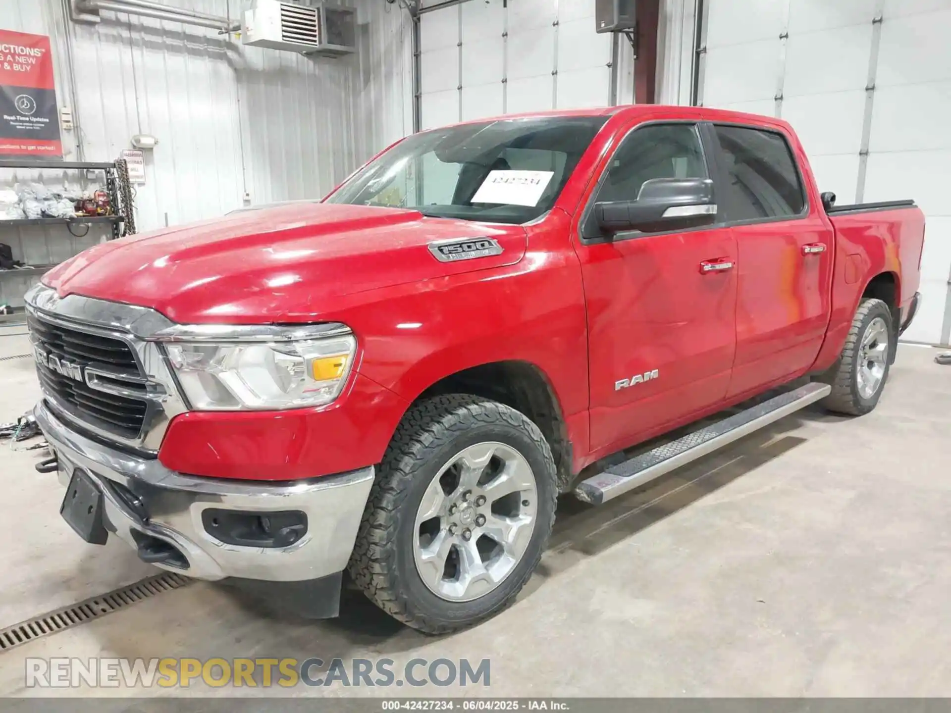 2 Photograph of a damaged car 1C6SRFFT5KN780013 RAM 1500 2019