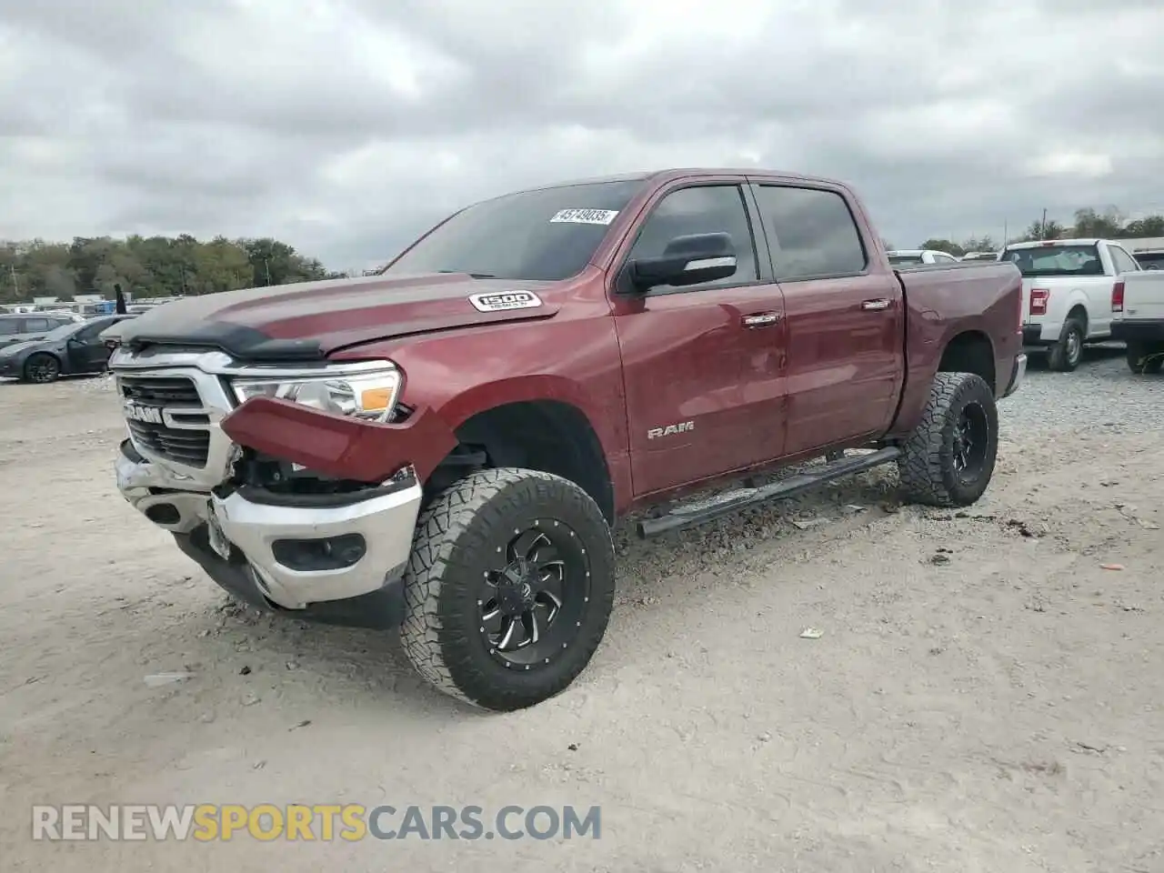1 Photograph of a damaged car 1C6SRFFT5KN839738 RAM 1500 2019