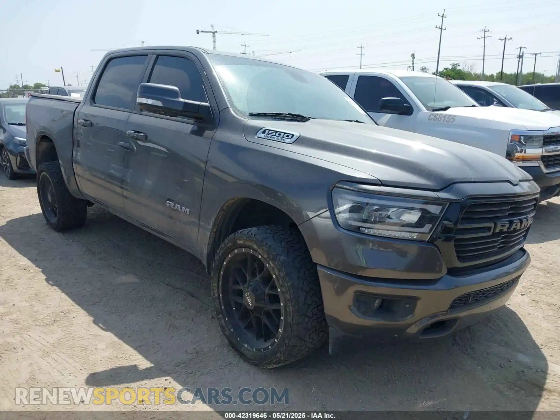 1 Photograph of a damaged car 1C6SRFFT5KN855678 RAM 1500 2019