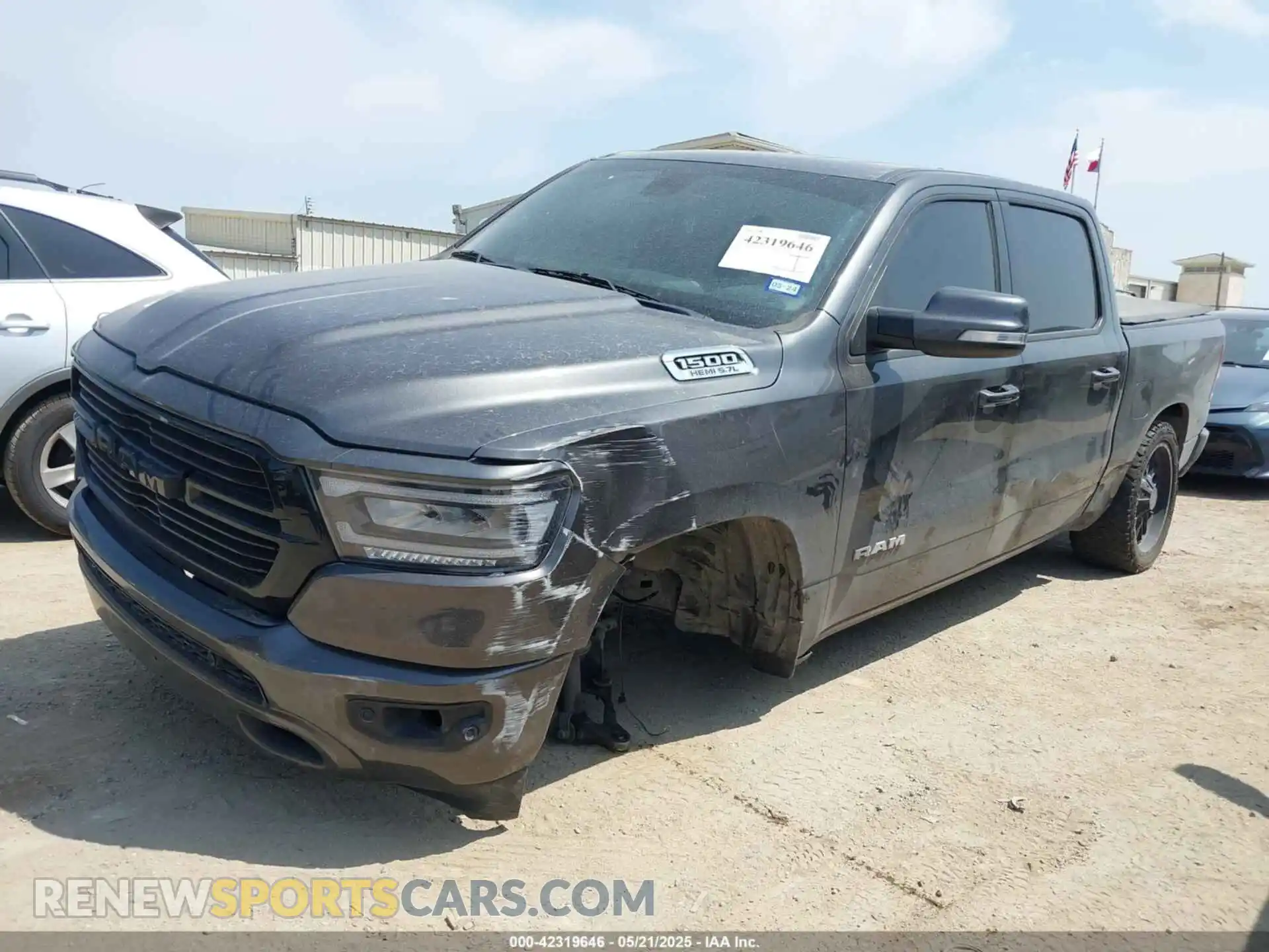 2 Photograph of a damaged car 1C6SRFFT5KN855678 RAM 1500 2019