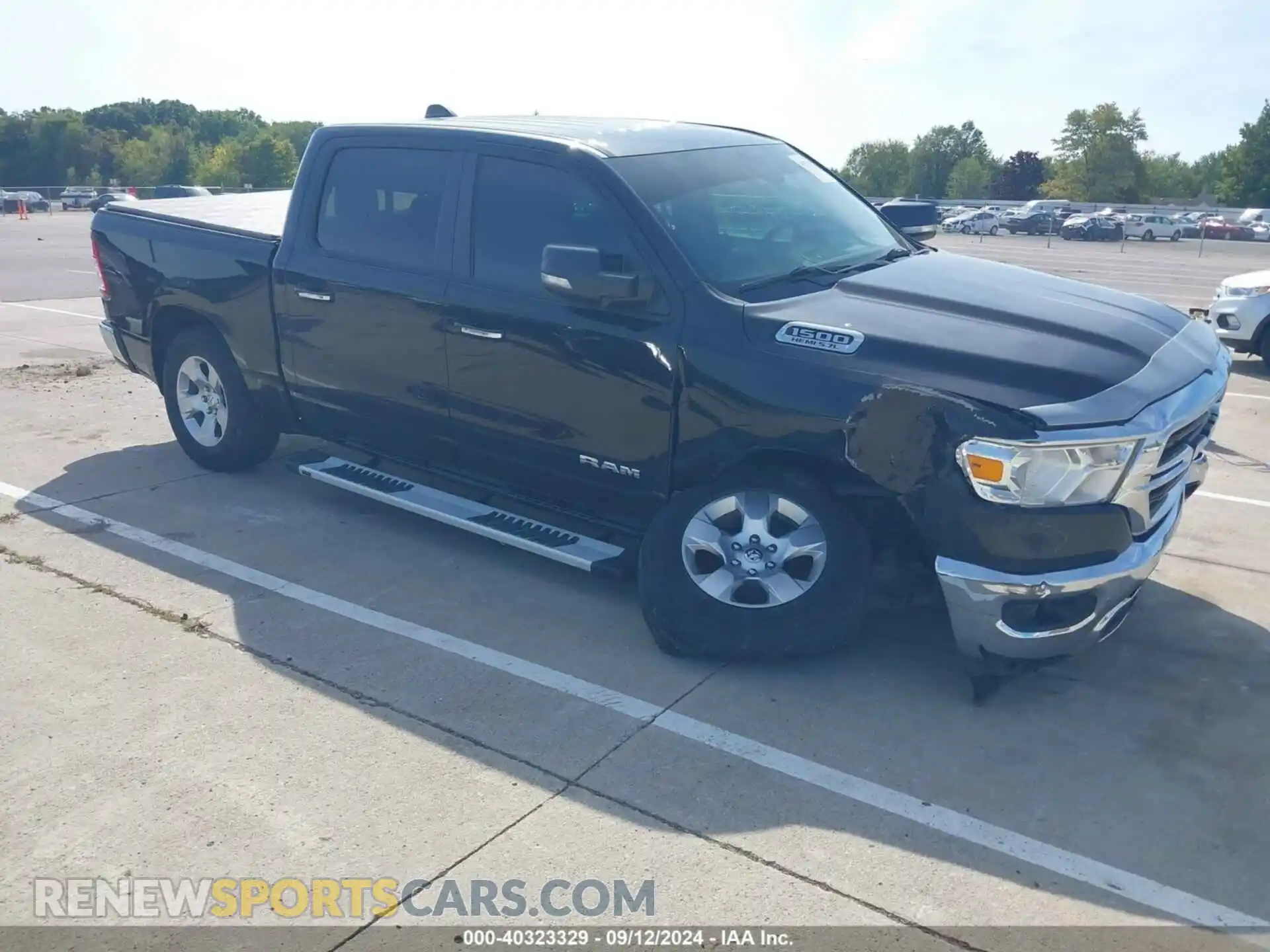 1 Photograph of a damaged car 1C6SRFFT6KN571315 RAM 1500 2019