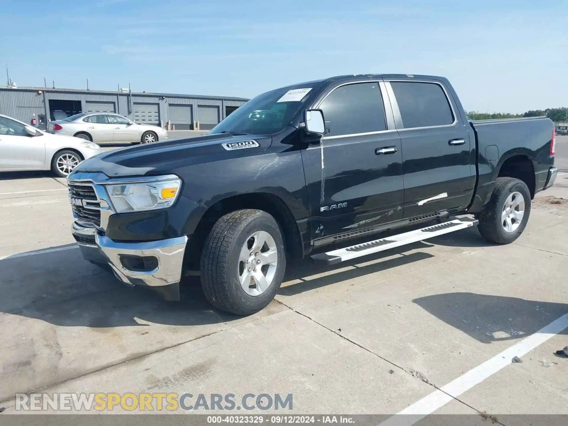 2 Photograph of a damaged car 1C6SRFFT6KN571315 RAM 1500 2019