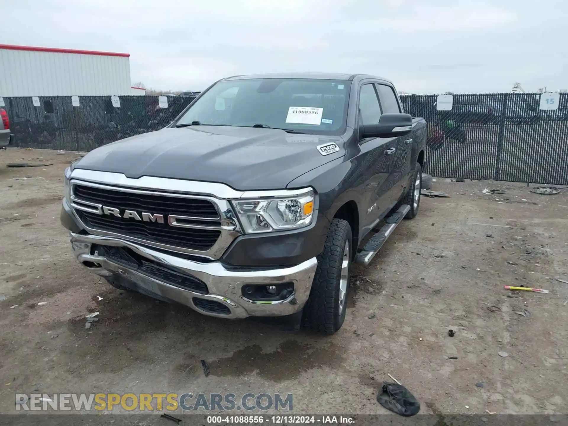 2 Photograph of a damaged car 1C6SRFFT6KN718104 RAM 1500 2019