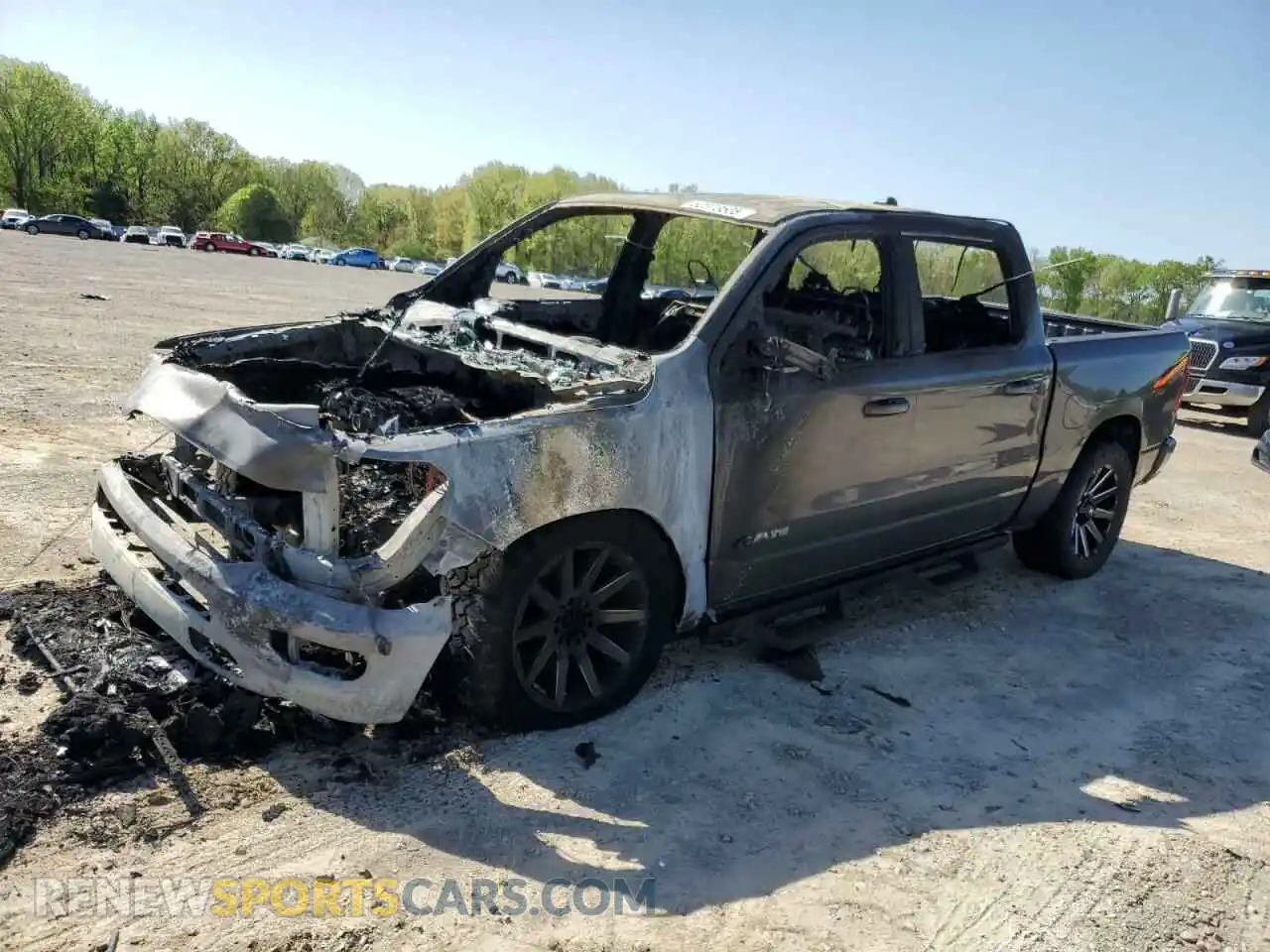 1 Photograph of a damaged car 1C6SRFFT6KN784684 RAM 1500 2019