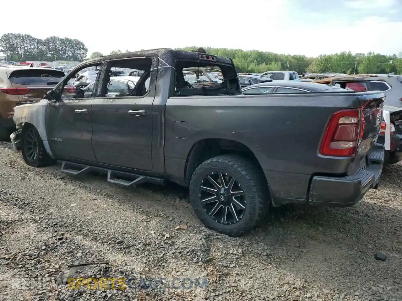 2 Photograph of a damaged car 1C6SRFFT6KN784684 RAM 1500 2019