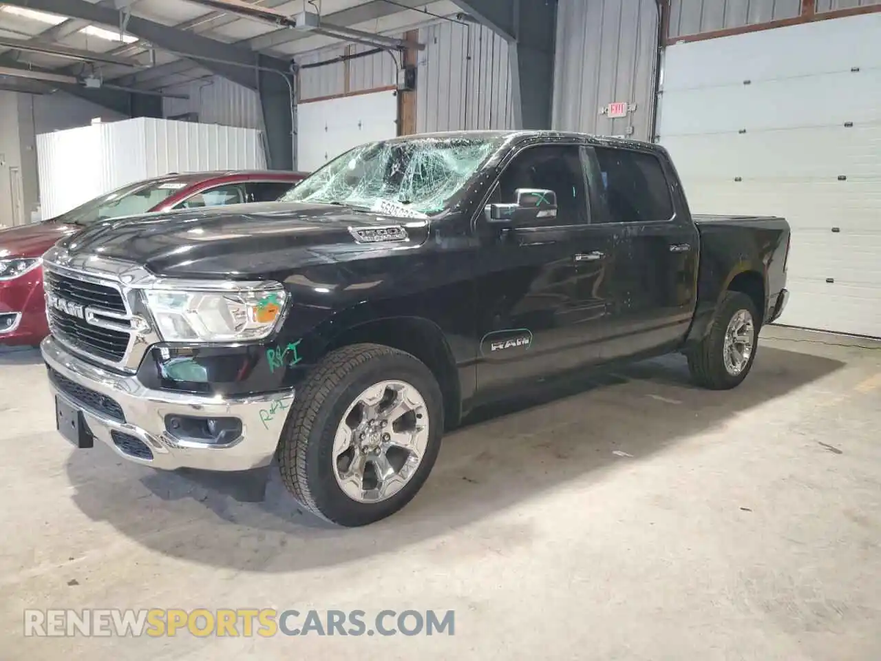 1 Photograph of a damaged car 1C6SRFFT6KN802438 RAM 1500 2019