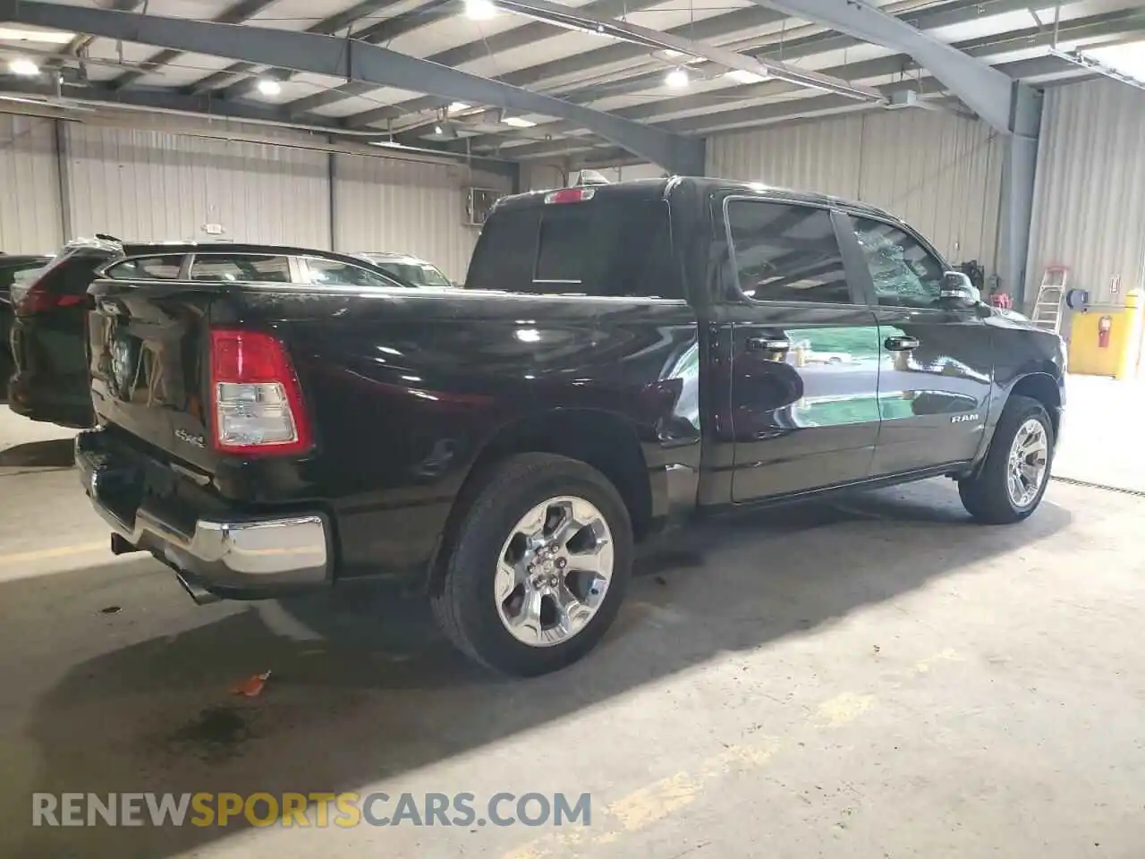 3 Photograph of a damaged car 1C6SRFFT6KN802438 RAM 1500 2019