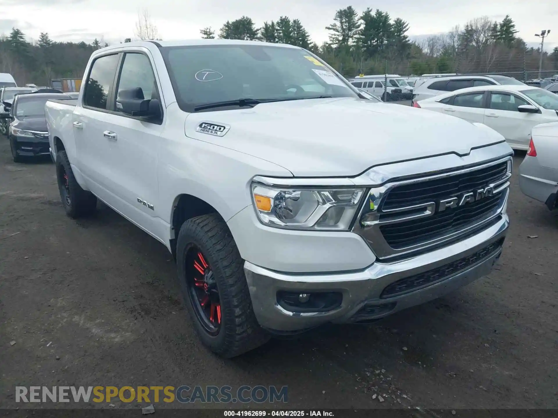 1 Photograph of a damaged car 1C6SRFFT7KN620411 RAM 1500 2019