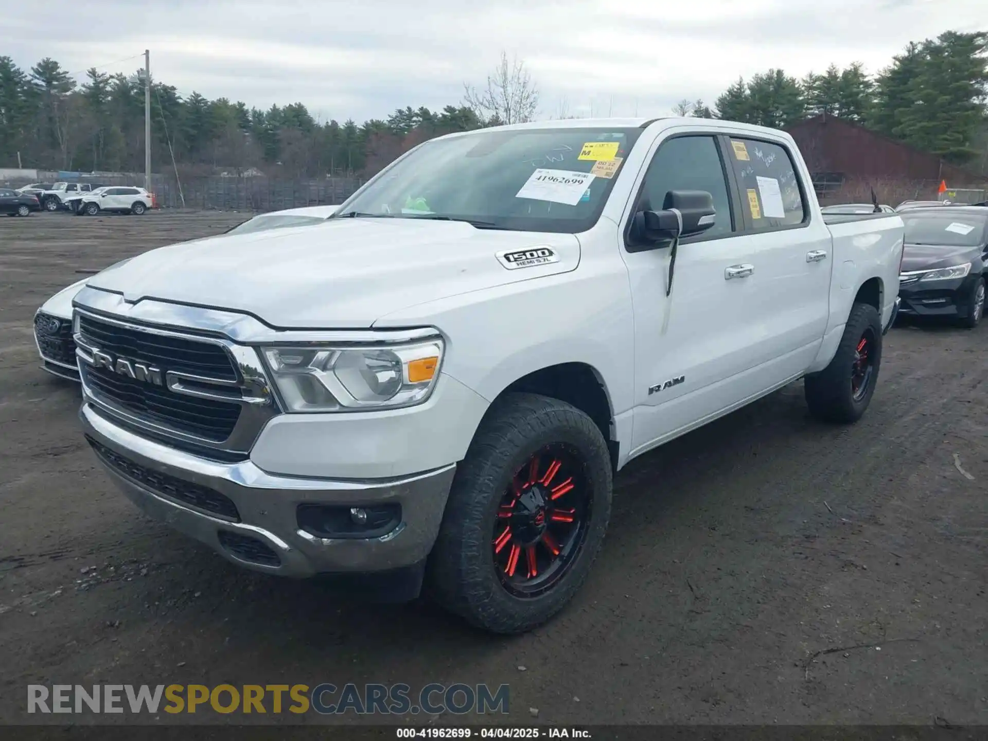 2 Photograph of a damaged car 1C6SRFFT7KN620411 RAM 1500 2019