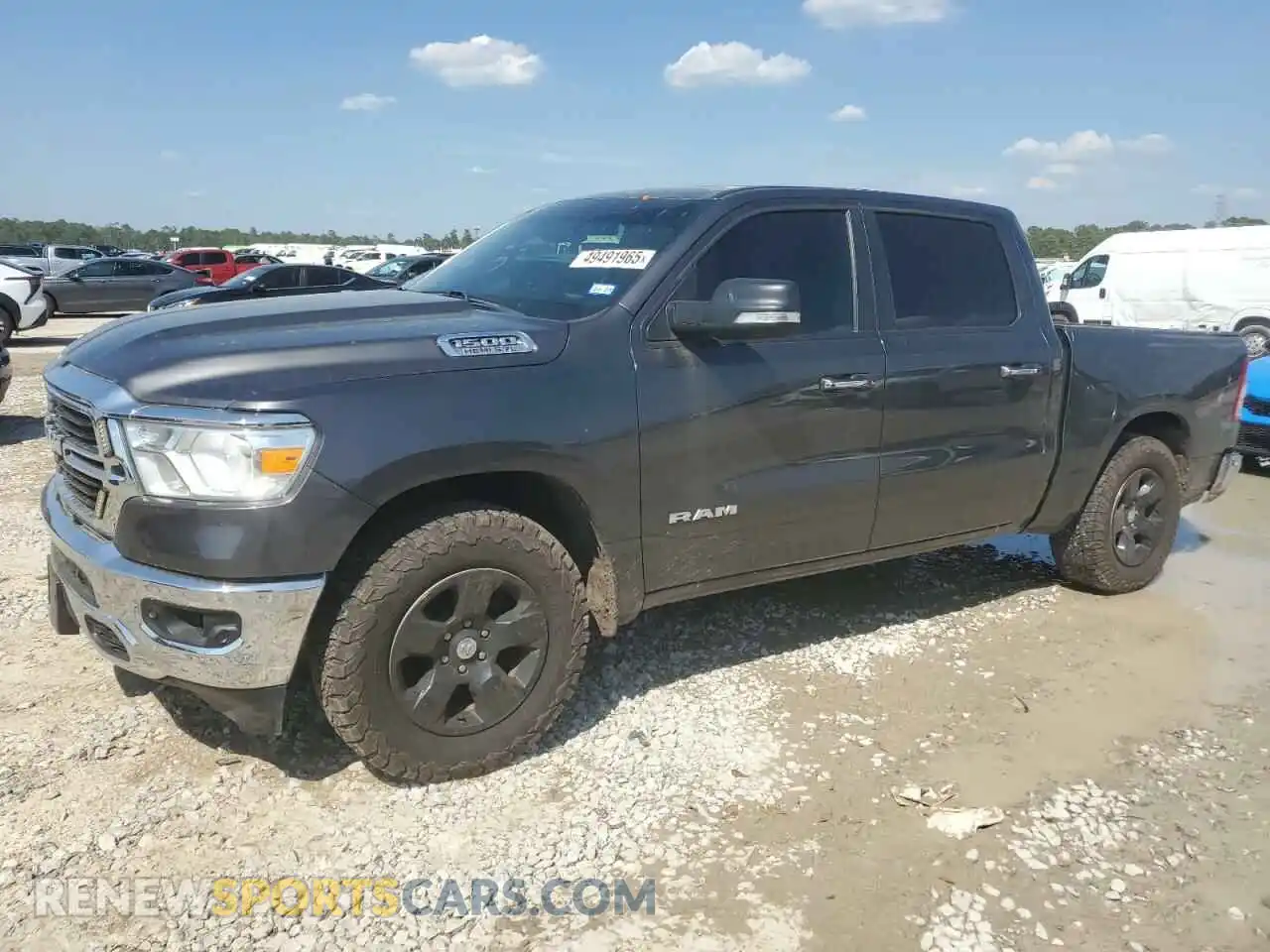 1 Photograph of a damaged car 1C6SRFFT7KN668488 RAM 1500 2019