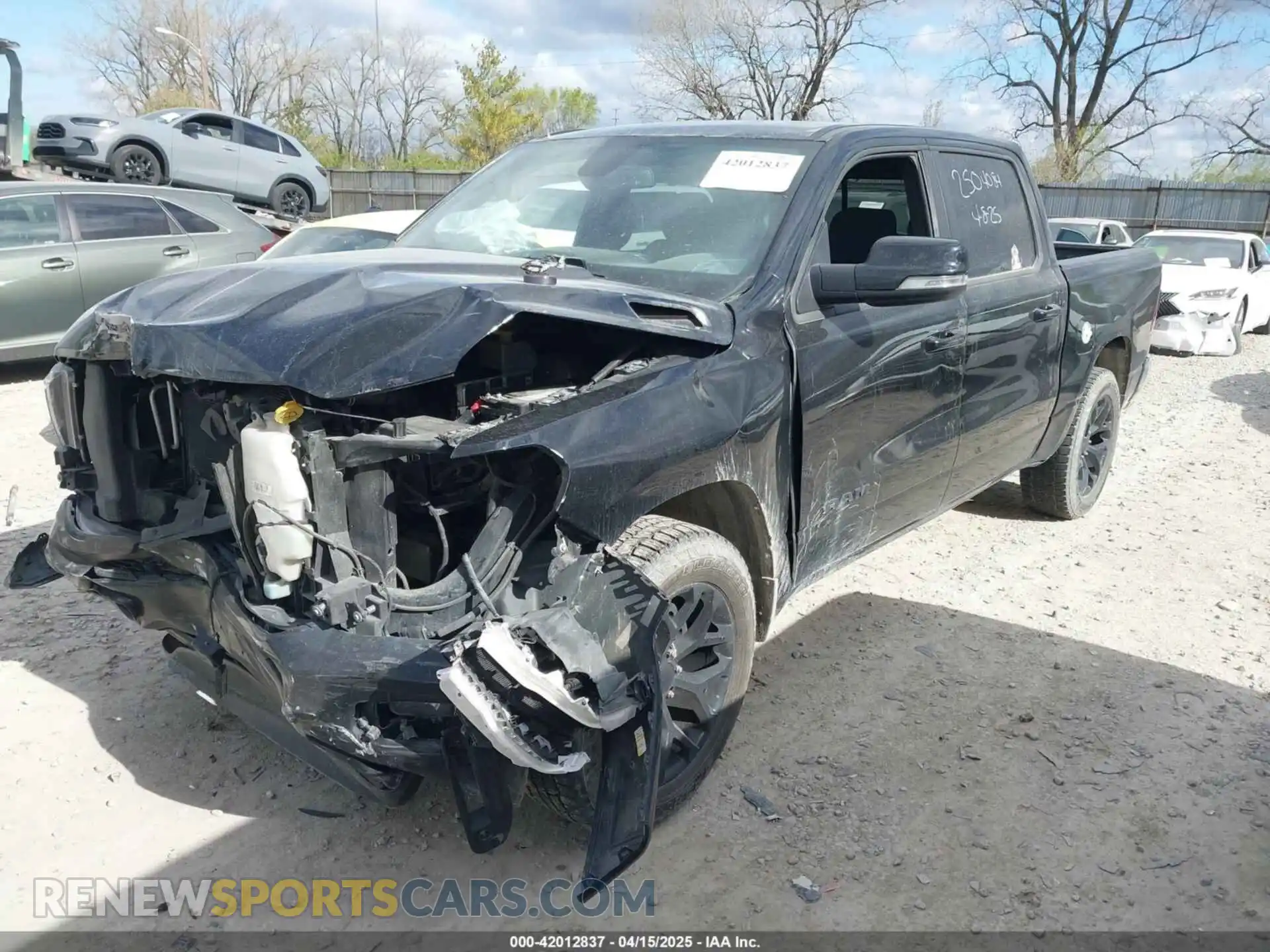 2 Photograph of a damaged car 1C6SRFFTXKN524482 RAM 1500 2019